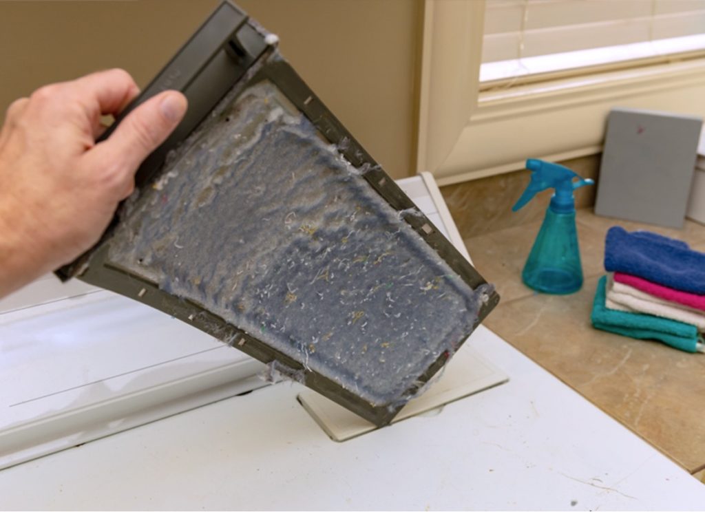 dirty lint trap for a clothes dryer